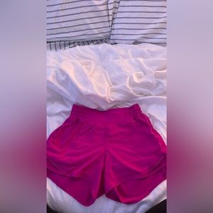 Lululemon hotty hot shorts. High rise. size 4, 4 inch. Used once. Sonic Pink